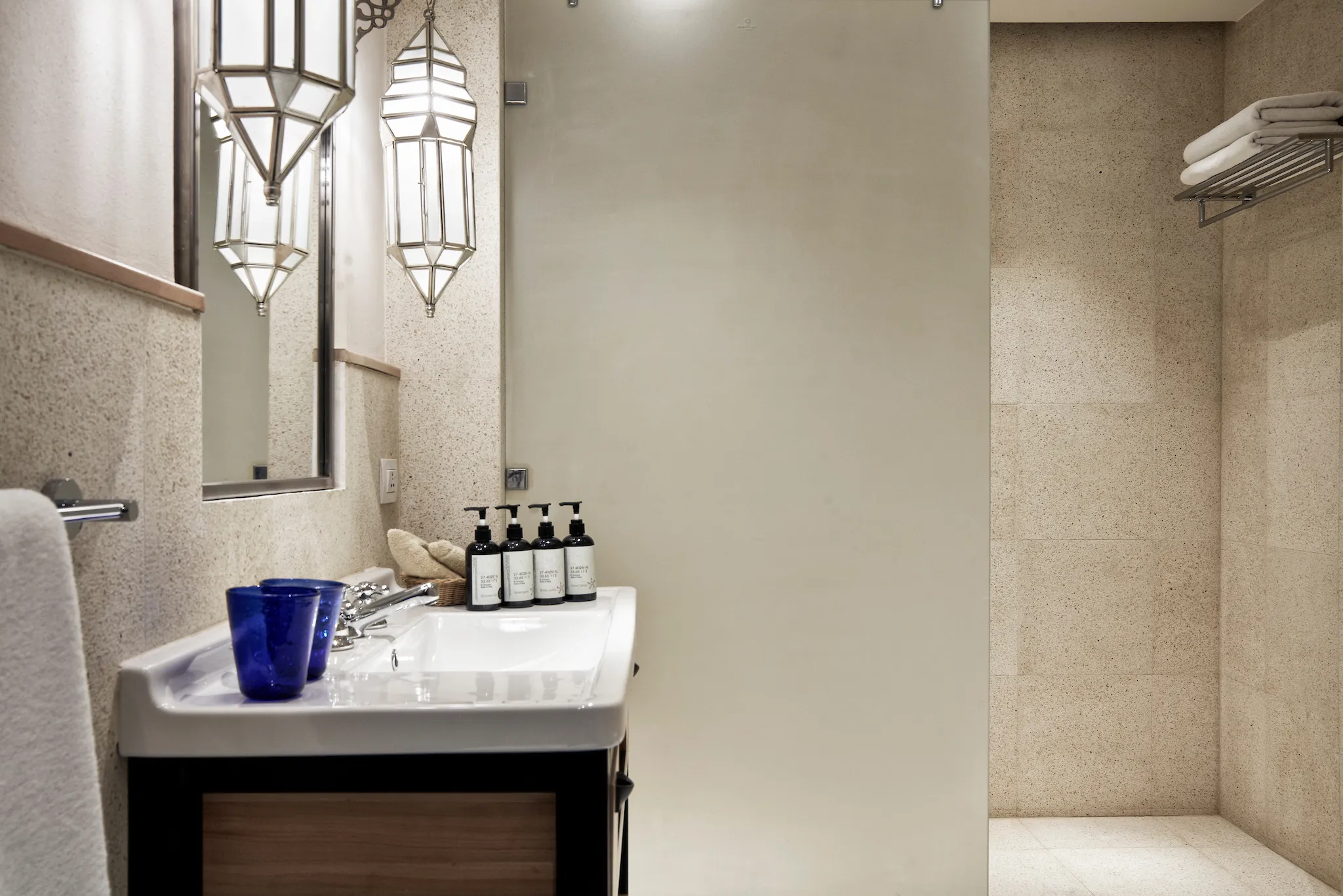 Junior Suite bathroom with vanity and walk-in shower at Ali Pasha Hotel El Gouna