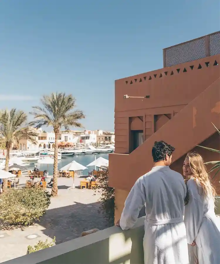 Couple Strolling in Gouna Streets