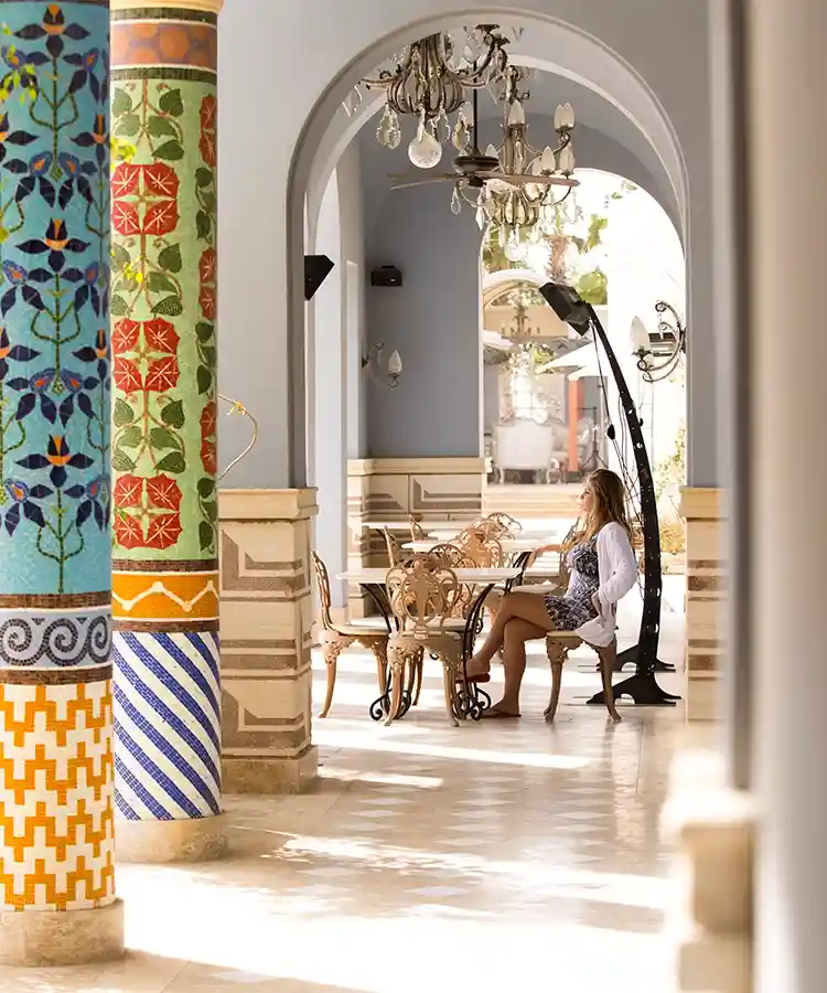 Women enjoying a scenic setting at La Maison Bleue el Gouna, immersed in the tranquil atmosphere and stunning views.