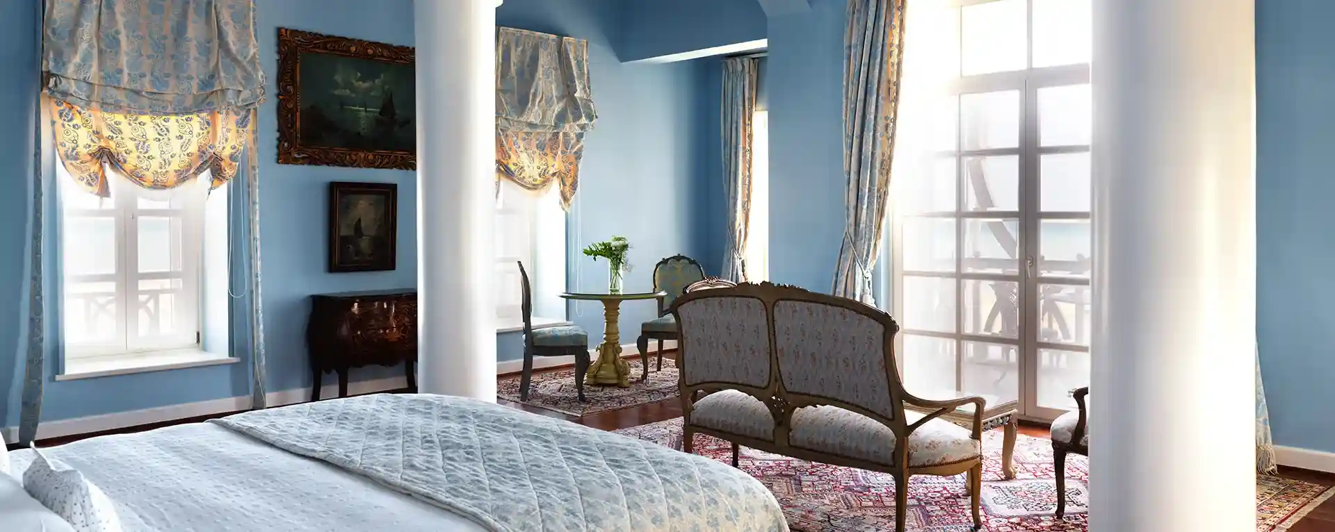 Classic hotel room at La Maison Bleue el Gouna, featuring timeless furniture and a cozy, traditional ambiance.