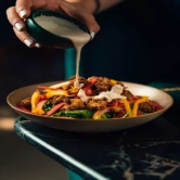 Food being prepared for serving at Fanadir.