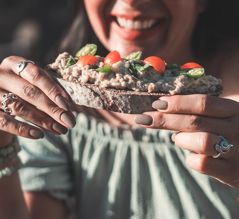 Woman Holding Sandwich