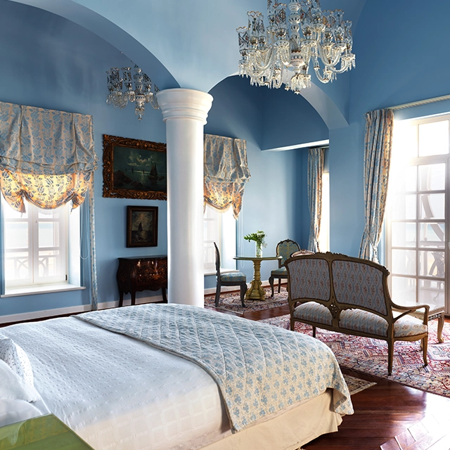 A room at La Maison Bleue el Gouna, embodying a classic theme with elegant furnishings and timeless charm.