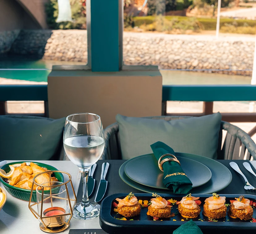 Dining experience at Mosaique Hotel, featuring gourmet cuisine in a stylish and welcoming ambiance.