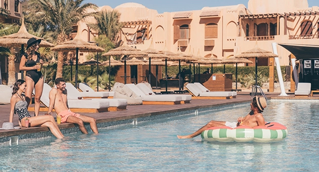Group enjoying Cook's Club Pool