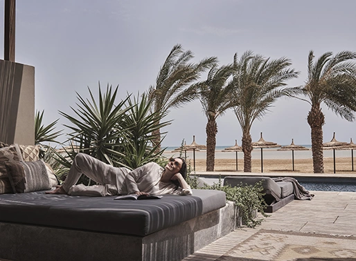 Woman enjoying Junior Suite shared pool