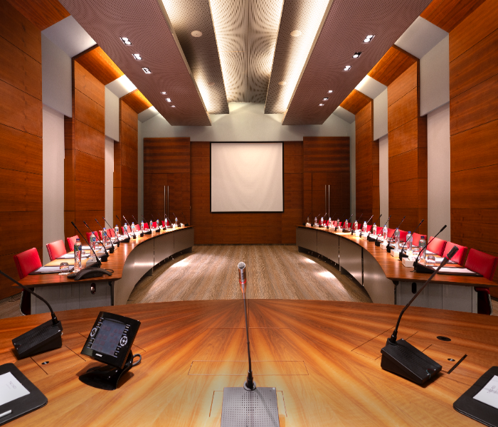 Meeting Room at Chedi El Gouna, featuring a modern setup with conference table, chairs, and presentation equipment.